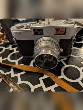 Vintage 35mm Film Rangefinder Camera in Silver and Black